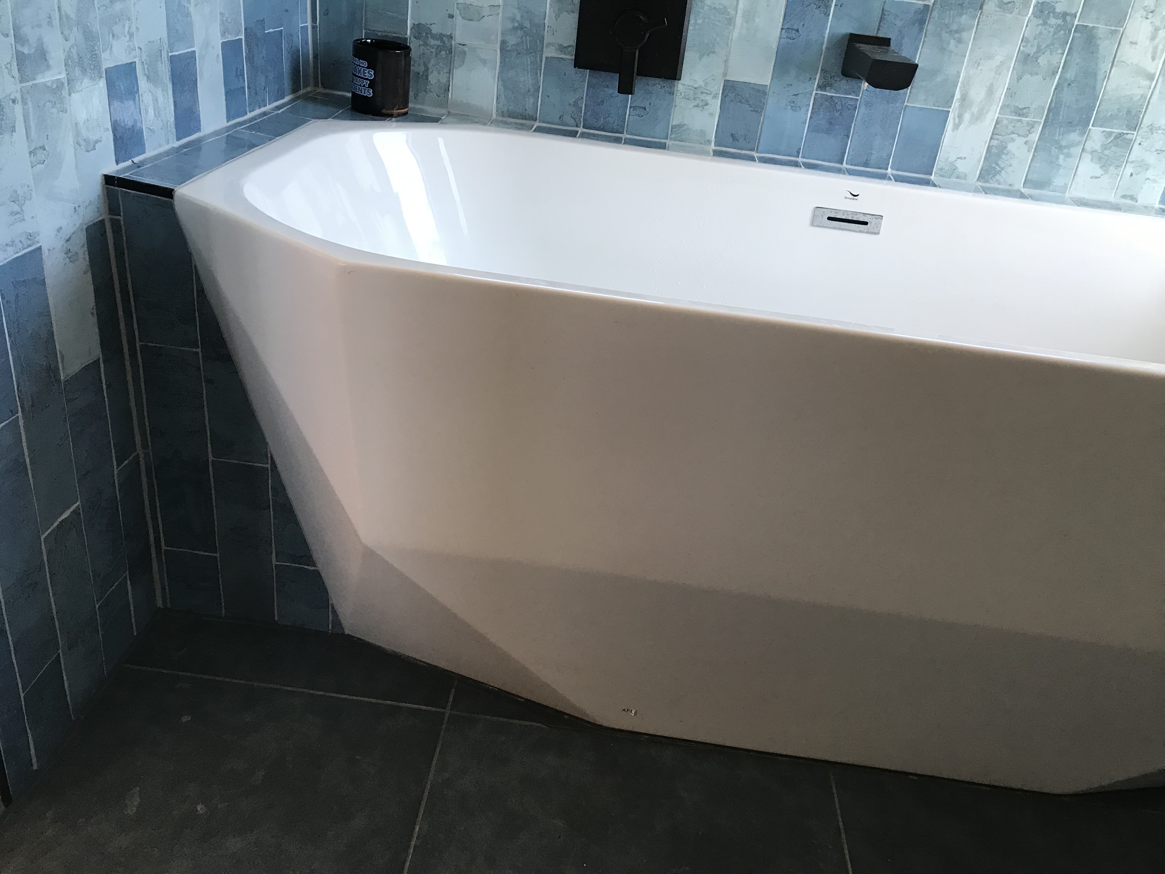 Shower Pan with Tileable Linear Drain by Expert Touch Tiling in